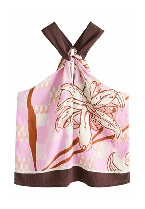 Roze en bruine bloemen haltertop met grote lelieprint, brede bruine bandjes die kruisen bij de nek, en een bruine zoom aan de onderkant.