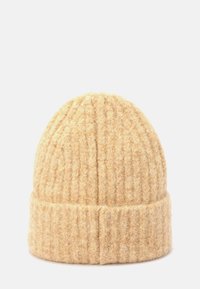 Tan knit beanie made of wool, features a ribbed texture and a fold-over cuff for warmth and comfort.