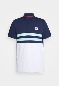 Polo bleu marine avec une section inférieure blanche et deux bandes bleu clair traversant la poitrine. Comprend un col et un petit logo sur la gauche.