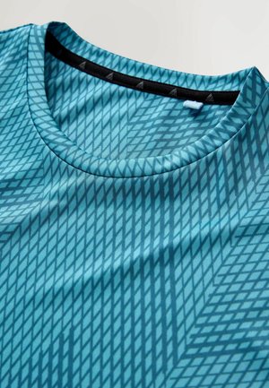 Turkis sportstrøje med et struktureret diamantskærm, rund halsudskæring og kontrastfarvet sort krave. Letvægtsmateriale.