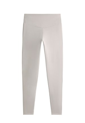 Helle graue Leggings aus glattem, dehnbarem Stoff. Mit einem hohen Taillenbund und schmaler Passform, die bis zum Knöchel reichen, ohne Muster.