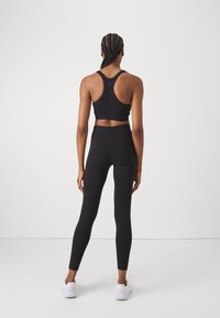 Champion C-TECH LEGGINGS FITTED - Leggings - black