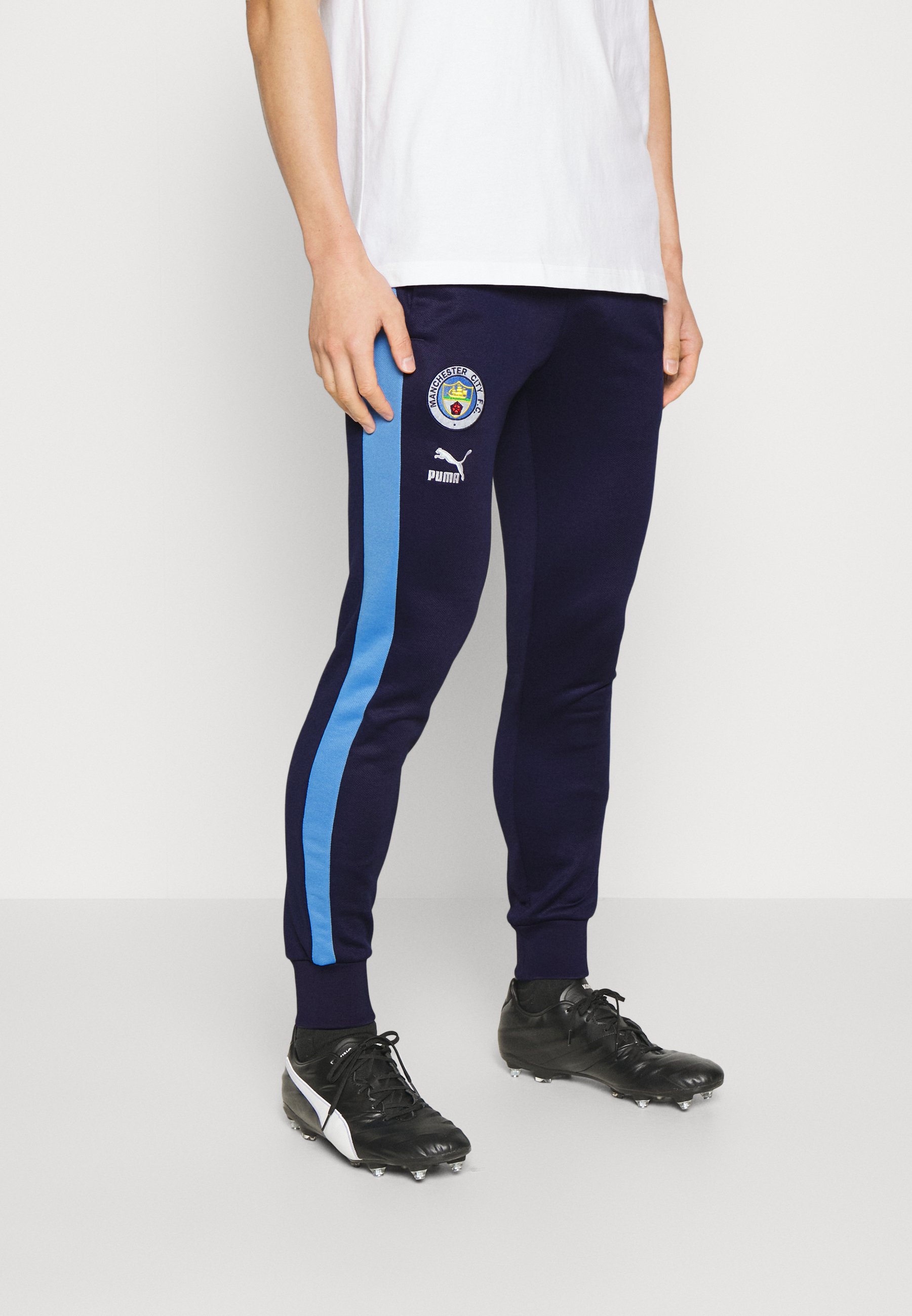 Puma MANCHESTER CITY FTBLHERITAGE T7 TRACK PANTS de clubes - navy/team light blue/azul - Zalando.es