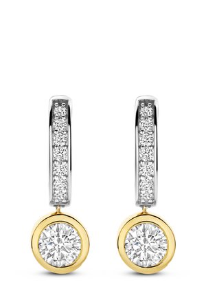 Silver and gold drop earrings with a row of small diamonds on the hoop and a large round diamond encased in gold at the bottom.