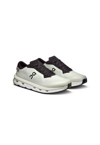 Light gray and black running shoes with mesh fabric, cushioned sole, and lacing system; features logo on side and contrasting heel accents.