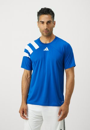 Blue athletic t-shirt made of smooth fabric, featuring white diagonal stripes on the left shoulder and a small logo on the chest.