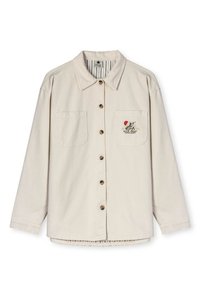 Beige overhemd met knopen van katoen, met twee borstzakken, bruine knopen en een speelse geborduurde ontwerp op de linkerzak.