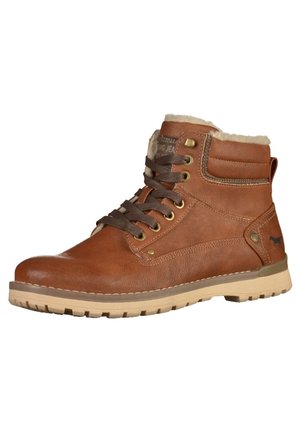 Bruna läderankelstövlar med konstpälsfoder, rund tå, metallöglor och en ljusgummisula med texturerat mönster.