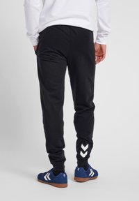 Hummel PANT - Trainingsbroek - black