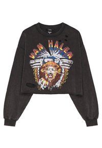 Svart kort sweatshirt med en lion grafik, som har texten "VAN HALEN". Den har en sliten yta och tre runda utskärningar på framsidan.
