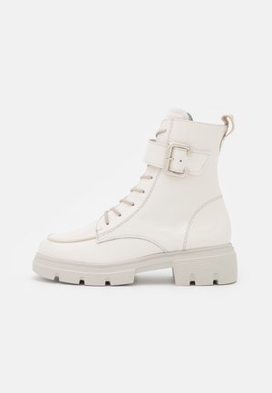 Stivaletti con plateau - white