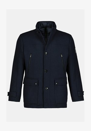 Navy wool blend jacket with a stand collar, front buttons, zippered chest pocket, and two large front pockets. Features a textured finish.