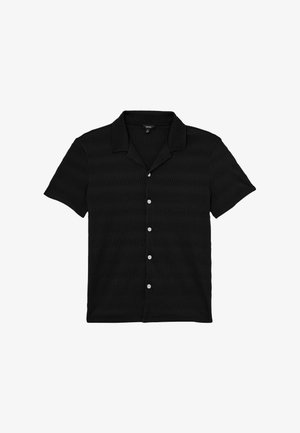 Chemise noire à manches courtes avec motif texturé, col de type camp et cinq boutons blancs sur le devant.