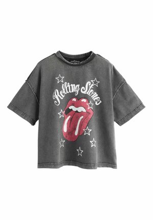 Graues oversized T-Shirt mit Rolling Stones Zungenlogo, umgeben von weißen Sternen, und dem Text "Rolling Stones" über der Grafik.