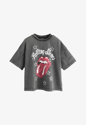 Szürke bő fazonú póló Rolling Stones nyelv logóval, fehér csillagokkal körülvéve, és a grafika fölött a "Rolling Stones" felirattal.