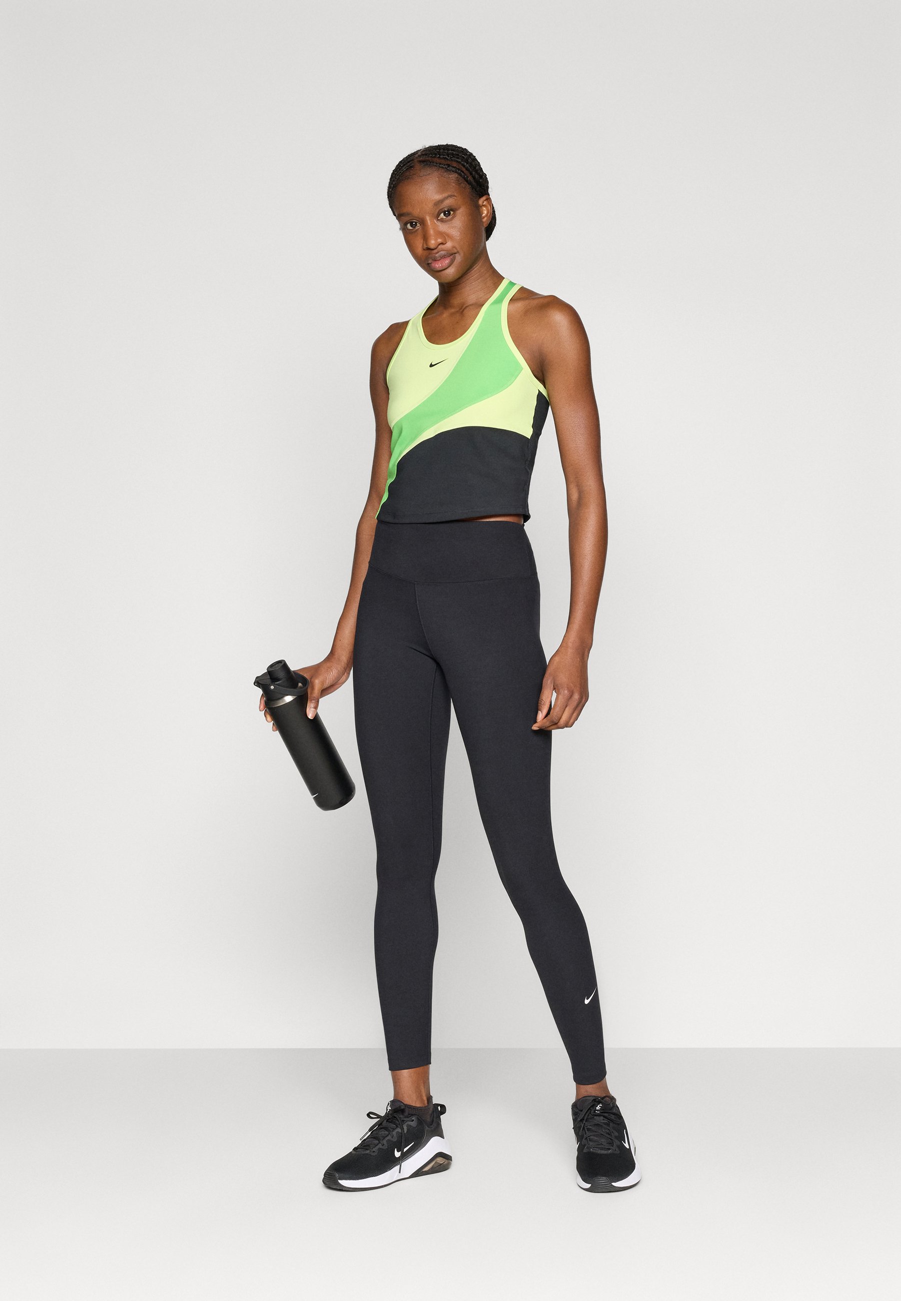 black and lime green nike leggings