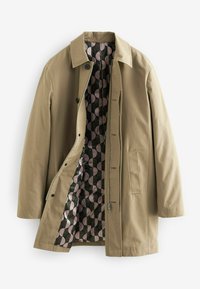 Beige yderfrakke med krave-design, der har et mønstret sort og pink indvendigt foer. Inkluderer knapper og sidelommer.