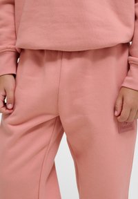 Hummel CLEAN ADJUSTABLE - Trainingsbroek - rose dawn