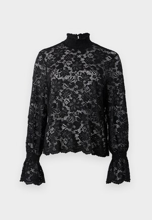 Top de encaje negro con cuello alto, mangas largas y puños acampanados. Presenta un patrón floral y un acabado texturizado. Ligero y semitransparente.