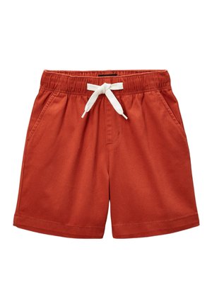 Shorts couleur rouille avec taille élastique, lien de serrage blanc et poches latérales.