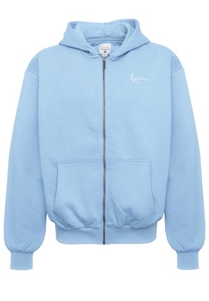 Light blue zip-up hoodie made of soft fabric, featuring a kangaroo pocket, ribbed cuffs, and a small white logo on the chest.