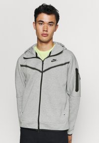 Nike Sportswear - M NSW TCH FLC FZ WR - Felpa con zip - dk grey heather/black Immagine in miniatura 1