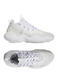 Weiße Sportschuhe mit einer strukturierten Oberseite, synthetischem Material und einem wellenförmigen Sohlen-Design. Merkmale sind auffällige Schnürungen und Dämpfungselemente.