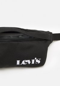 Levi's® SMALL BANANA SLING VINTAGE MODERN LOGO UNISEX - Marsupio - regular black