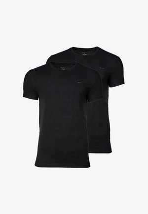 Dve črne bombažne majice s kratkimi rokavi in okroglimi izrezi, ki na prsih imajo subtilen logotip. Gladka tekstura tkanine.