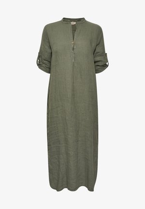 Olīvu zaļa lina kleita ar iedobītu apkakli, vienu pogu aizdari, ruļļveida piedurknēm un brīvu, plūstošu siluetu.
