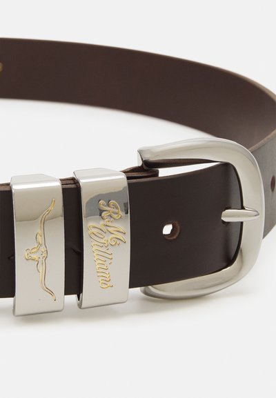 Brown leather belt featuring a silver metal buckle with engraved accents and a kangaroo logo. Utilitarian design with smooth texture.