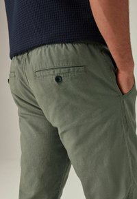 Next SLIM FIT zielony