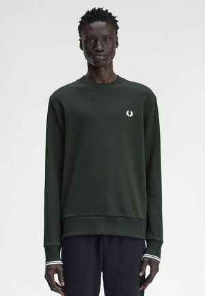 Sudadera verde oscura de manga larga, con puños acanalados y un logo blanco en el pecho. Tejido suave con un corte relajado y dobladillo acanalado.