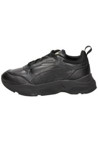 Black athletic sneakers with a textured leather and mesh upper, featuring a thick rubber sole, laces, and a pull tab on the back.