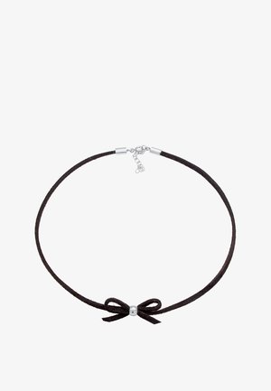 Choker en suède noir avec une petite perle centrale en argent et un détail en nœud, muni d'un fermoir simple avec une chaîne ajustable.