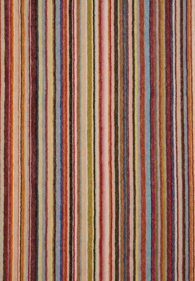Multicolored striped rug featuring vertical lines in red, blue, beige, green, and brown, with a textured fabric surface.