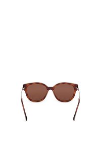 Ochelari de soare tortoise brown cu rame rotunde. Lentile de culoare maro închis, accente argintii pe brațele ochelarilor, finisaj neted și un design ușor supradimensionat.