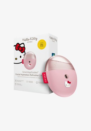 Roze ovaal Hello Kitty gezichtshydratatie mistapparaat met doorzichtige bovenkant en verpakkingsdoos met productnaam en kenmerken.