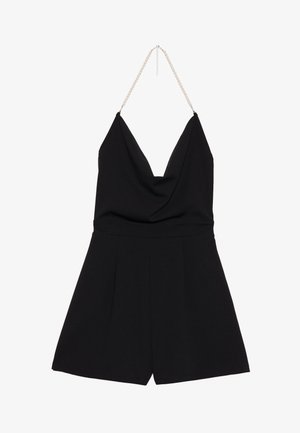 Black sleeveless romper with a deep V-neck, draped front, pleated shorts, and a pearl chain strap for added detail.
