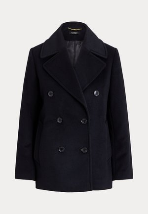 Abrigo cruzado azul marino de paño, confeccionado en lana, con grandes botones, solapas anchas y bolsillos laterales. Forro interior suave.