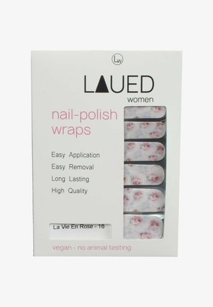 Fascette per unghie in una scatola con motivi di rose rosa su uno sfondo chiaro; include istruzioni per l'applicazione e certificazione vegana.