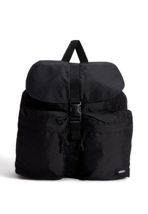 Black backpack made of durable fabric, featuring a flap closure, adjustable straps, front pockets, and a logo tag at the bottom.