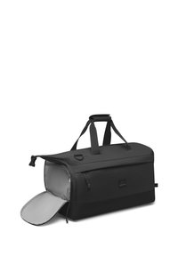 Musta duffel-laukku pehmeällä harmaalla sisävuorella, jossa on kaksinkertaiset kantokahvat, vetoketjullinen sulku ja sivutasku säilytystä varten.