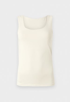 Débardeur sans manches de couleur crème avec un décolleté carré et un tissu lisse, présenté sur un fond gris clair uni.