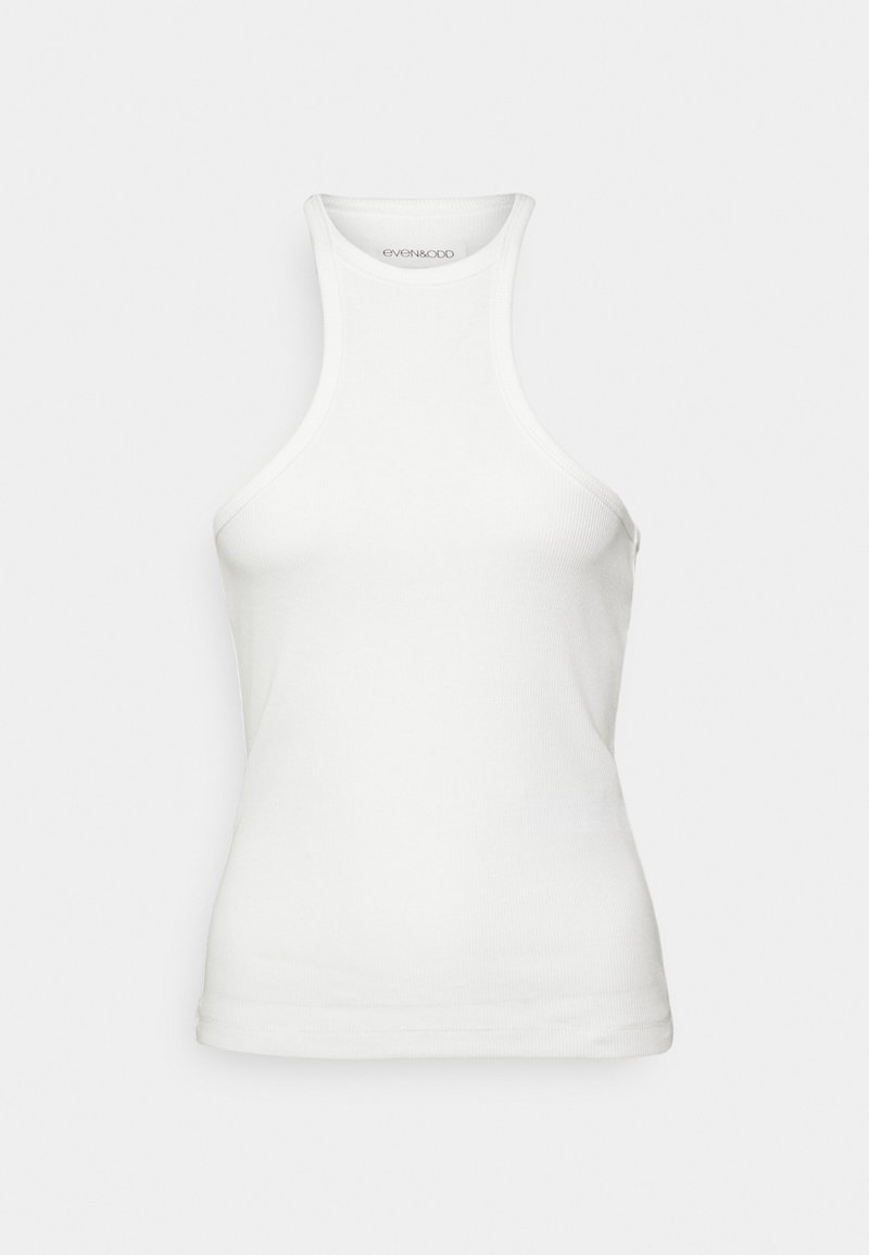Canotta bianca a coste con scollatura alta e design senza maniche. Presenta una forma aderente e una texture liscia. Etichetta del brand al collo.