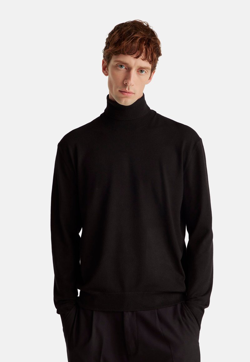 Schwarzer Rollkragenpullover aus weichem Stoff mit schlanker Passform, mit langen Ärmeln und einem gerippten Halsabschluss. Schlichtes Design ohne Muster.