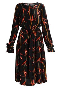 Langärmliges schwarzes Kleid mit einem bunten Blumenmuster in Rot und Grün. Verfügt über eine Krawatte in der Taille und geraffte Manschetten für zusätzliche Details.