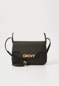 BlackDKNY crossbody bag with a structured design, gold hardware, and a textured surface. Features a long adjustable strap and logo detail.