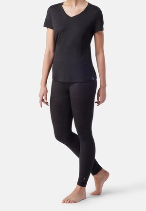 Black V-neck T-shirt with short sleeves paired with black leggings featuring a subtle textured pattern. Both are made of a lightweight fabric.