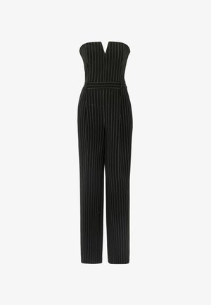 Combinaison noire à rayures avec un design sans bretelles et un décolleté en V profond. Présente un corsage ajusté, des jambes larges et une taille ceinturée.
